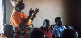 Ghanaian cocoa farmers at a meeting of their cooperative.