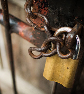 An image of a locked gate